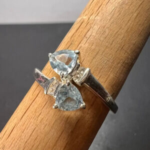 Trillium cut blue topaz bypass ring in rhodium over sterling silver size 9